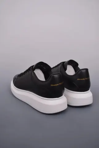 Alexander McQueen Trainers option Black and white background