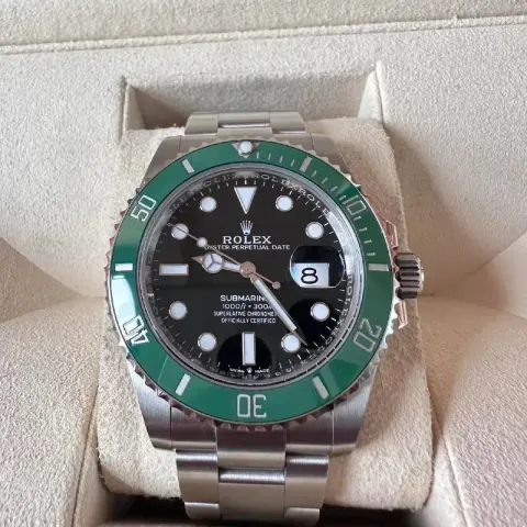 Rolex option Three generations of black face green water