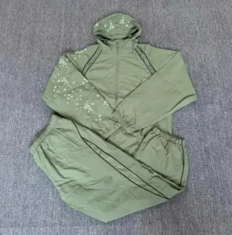 Supreme SS22 Week 3 AOI Glow-in-the-Dark Track Pants option green suit