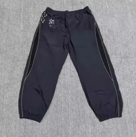 Supreme SS22 Week 3 AOI Glow-in-the-Dark Track Pants option black trousers