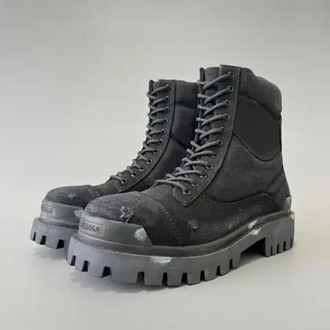 Balenciaga Strike Boots Black option black jeans