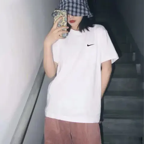 Nike T-shirt option White left hook