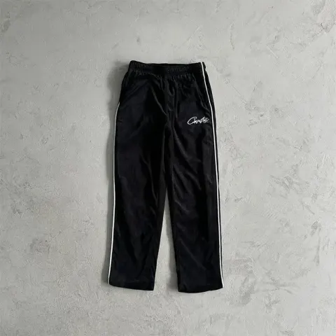 Corteiz Tracksuit Top option Black velvet trousers with a white label
