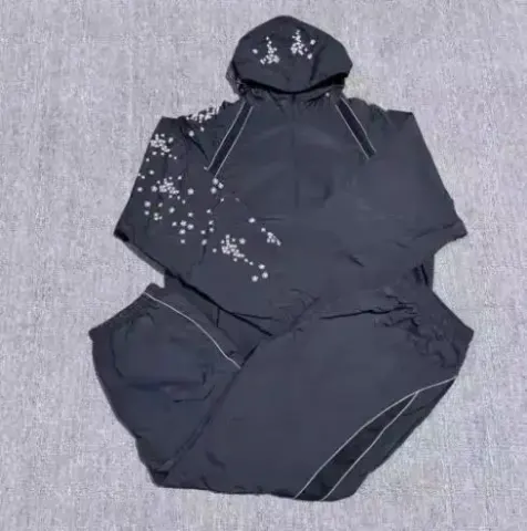 Supreme SS22 Week 3 AOI Glow-in-the-Dark Track Pants option black suit