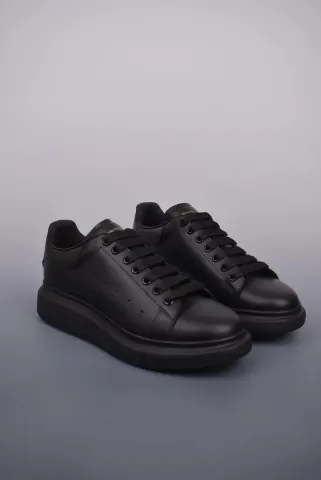 Alexander McQueen Trainers option pure black gold lettering