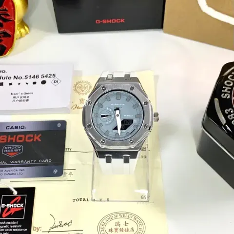 G-Shock Casio Watch With Rubber Band option Silver Shell  light blue Disk White Tape